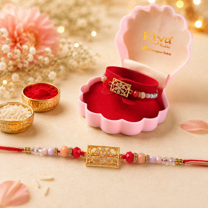 Rectangular AD Filigree Designer Rakhi for Brother with Pink Beads Gift
