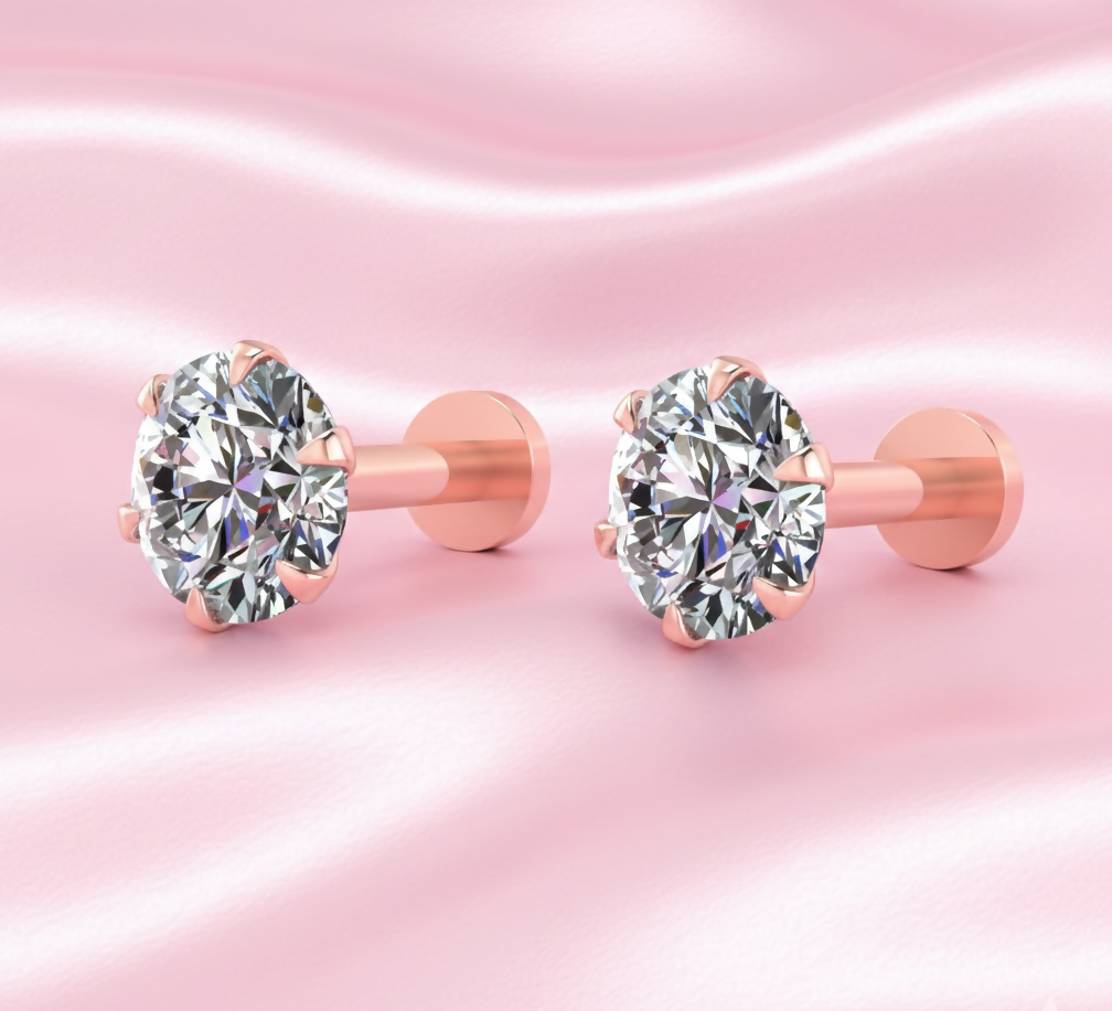 Closeup of rose gold plated nose stud showing six-prong setting for secure stone