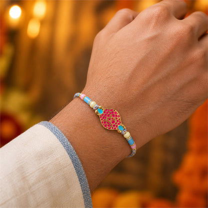 Festive Rakhi with Paisley Heart Charm, blue stones and wrist style for Gift Use