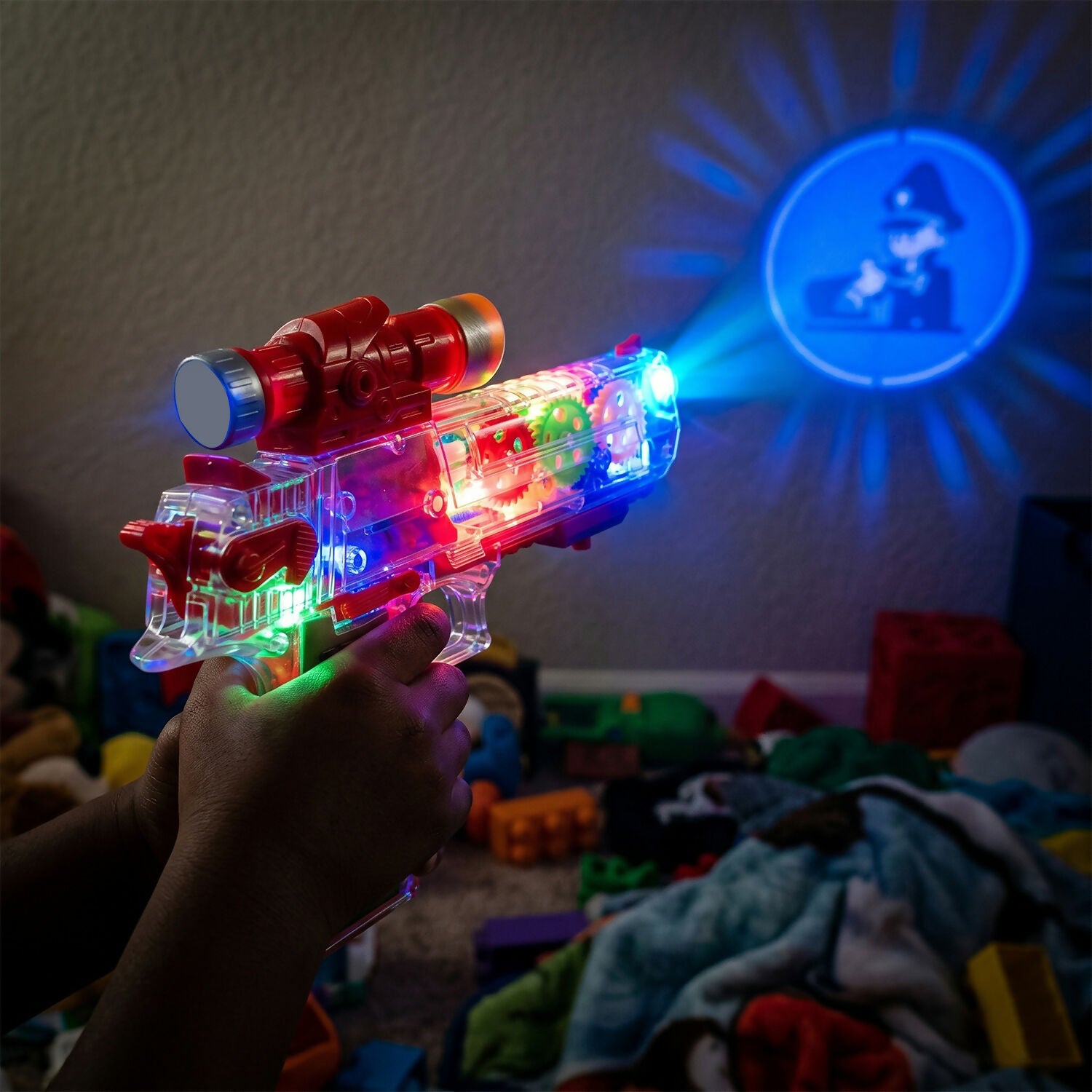 Multi-color LED light effects on gear toy gun during play