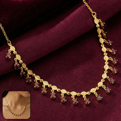 Gold plated leaf design necklace with red stone drops