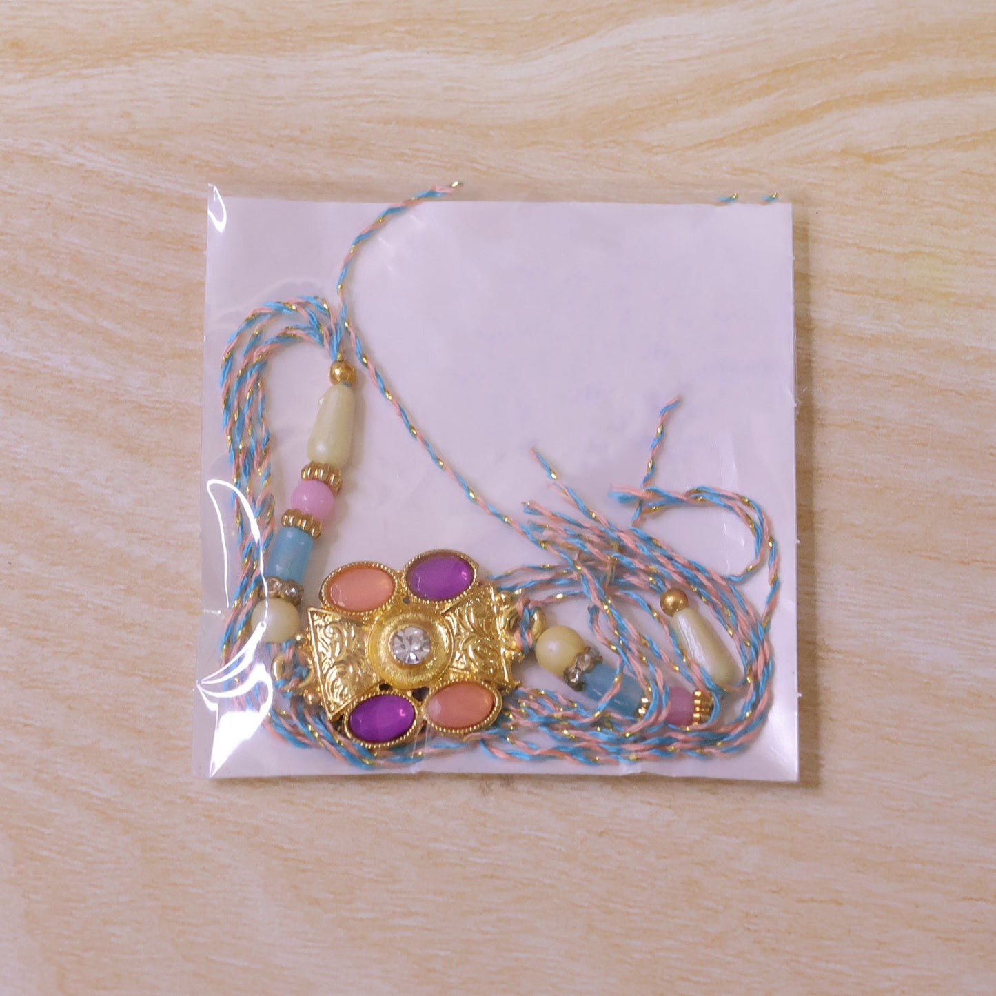Premium Rakhi with Multicolor Floral Medallion, bead line and chain look for Gift Use