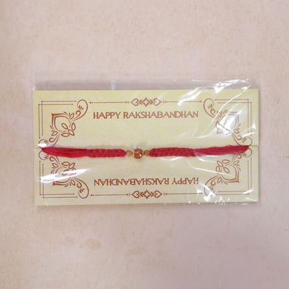 Red Braided Rakhi with a Natural Rudraksha Bead Pendant Accent