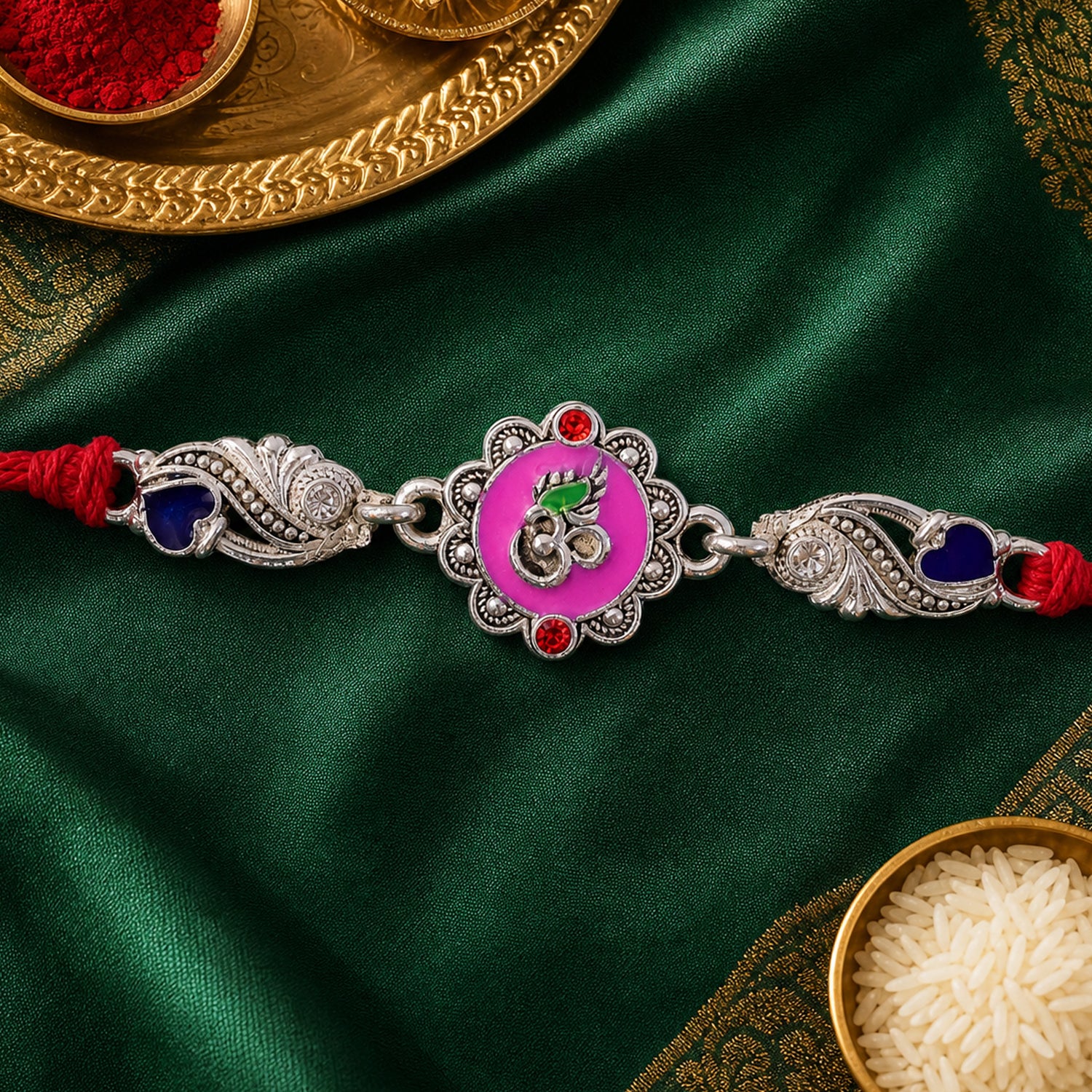 Premium Rakhi featuring Round Floral Medallion, gold trims and chain look for Gift