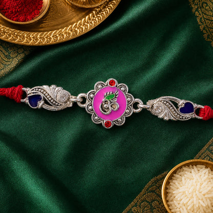 Premium Rakhi featuring Round Floral Medallion, gold trims and chain look for Gift