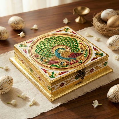 Side view of square handcrafted golden jewelry box