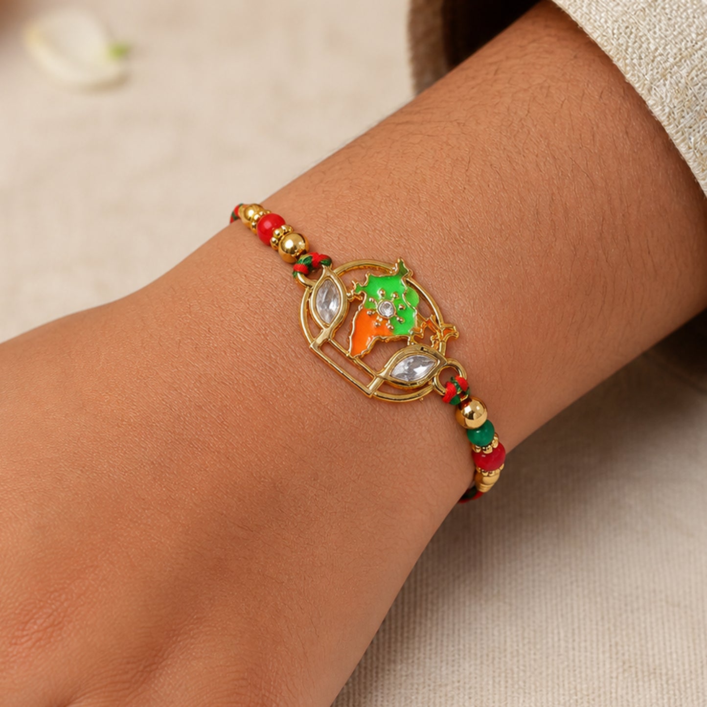 Bharat Map Pendant Rakhi with Kundan Stones and Red Beads