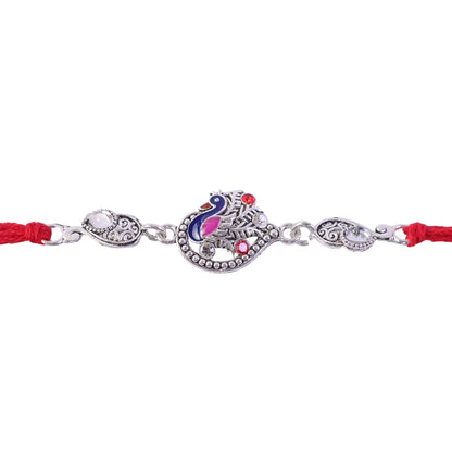 Silver-Toned Peacock Rakhi with Pink-Blue Enamel, Crystal Accents & Red Thread for Brother