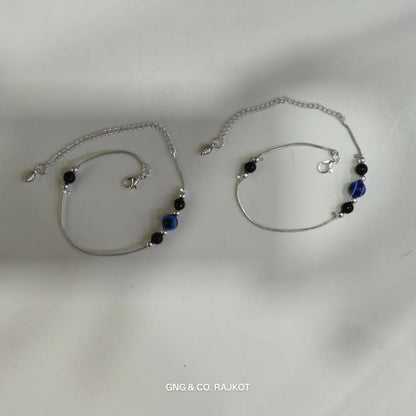 Women wearing silver-plated Evil Eye Anklet pair