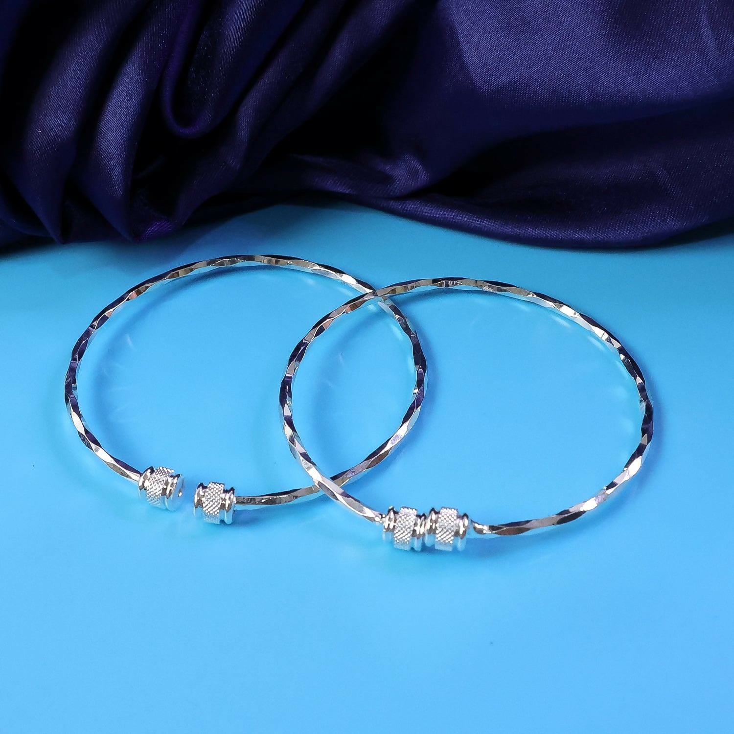 Rose gold stone studded kada bracelets worn with traditional outfit