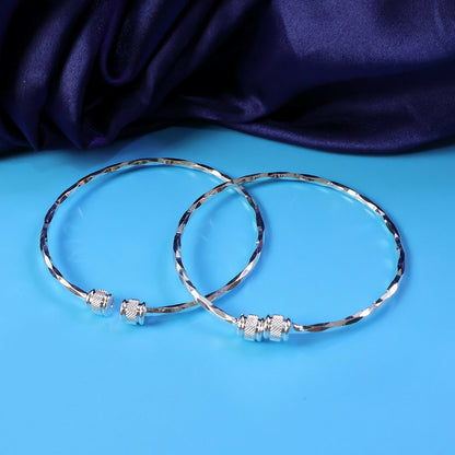 Rose gold stone studded kada bracelets worn with traditional outfit