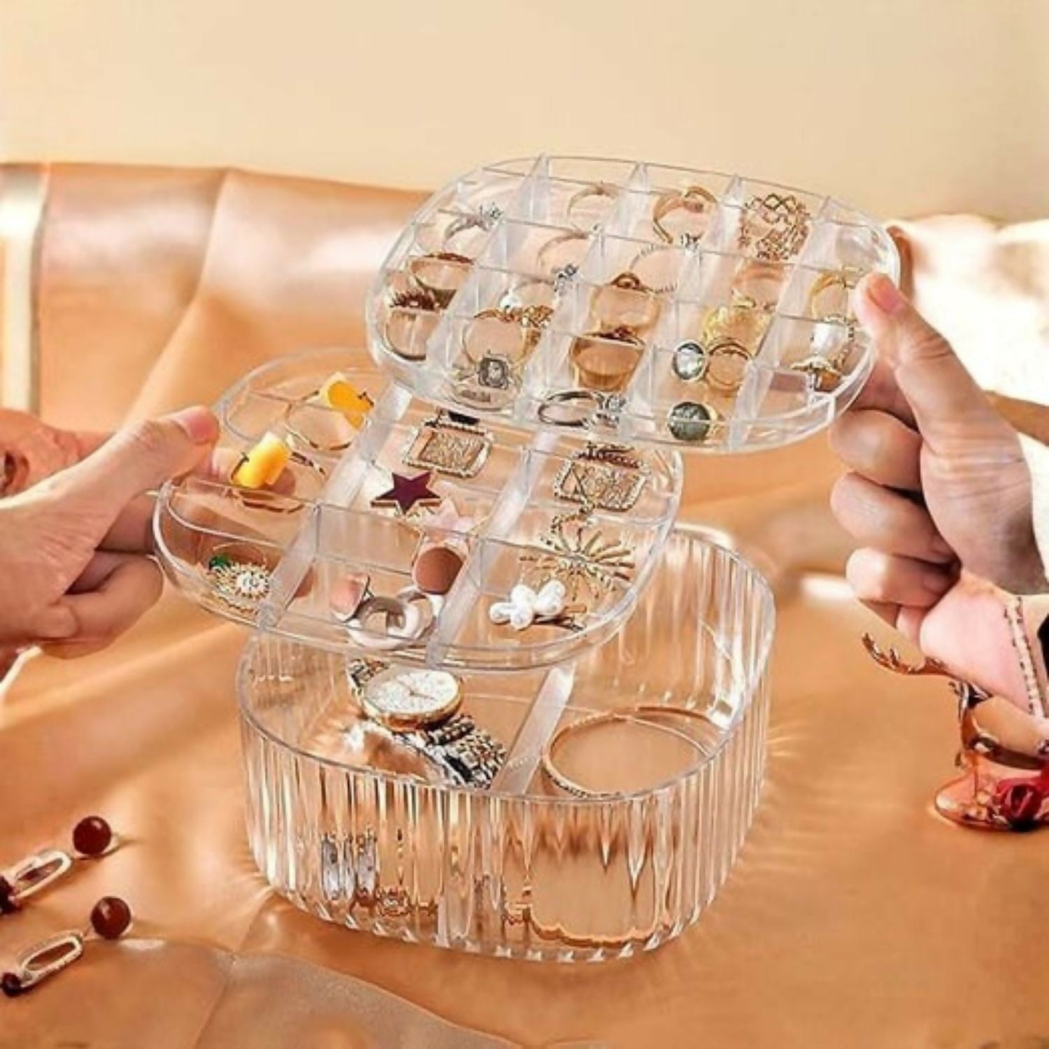Multi-layer transparent jewelry organizer box on a vanity