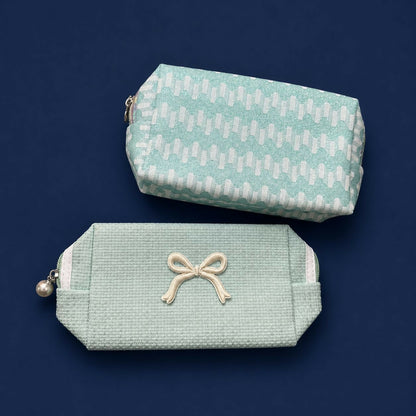 Compact travel organizer pouch with floral and embroidered design