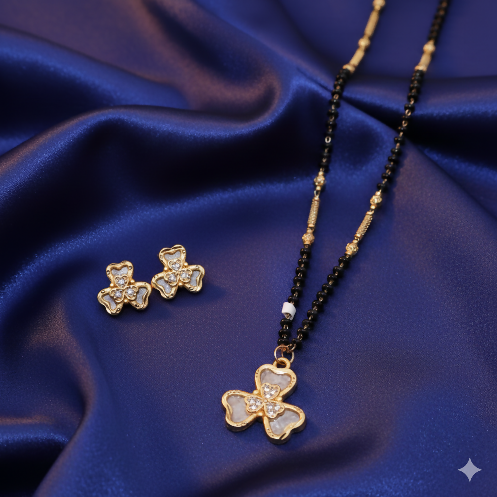Gold-plated AD floral mangalsutra necklace with black beads and clover stud earrings set