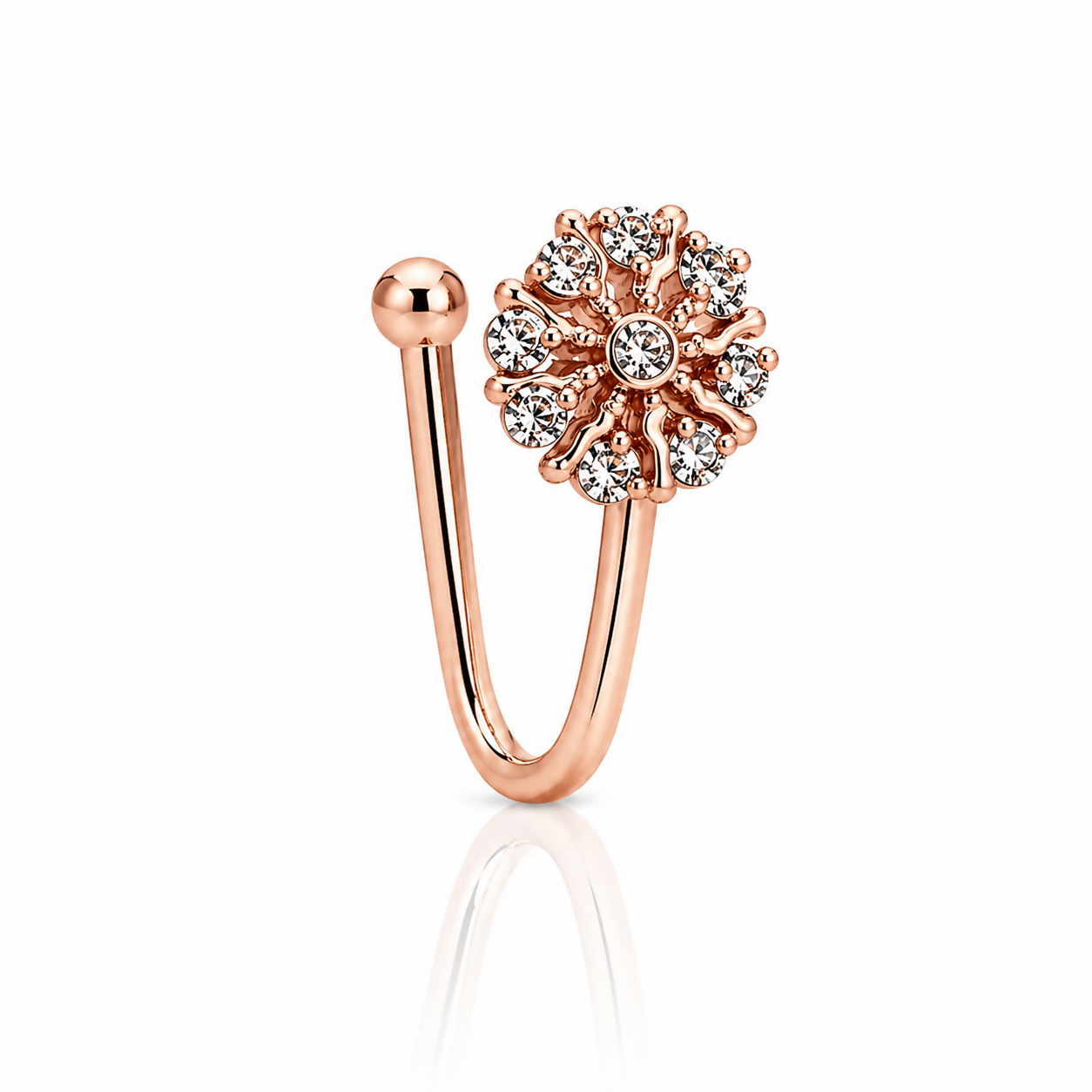 Close-up of rose gold flower nose stud with intricate design