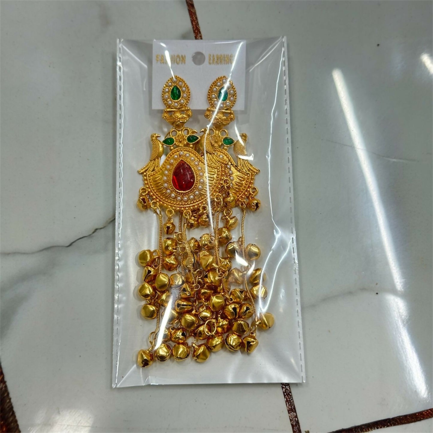 Kashmiri Heritage Gold-Plated Dangler Earring with Red Teardrop Stone, Pearl Detailing & Ghungroo Chains.