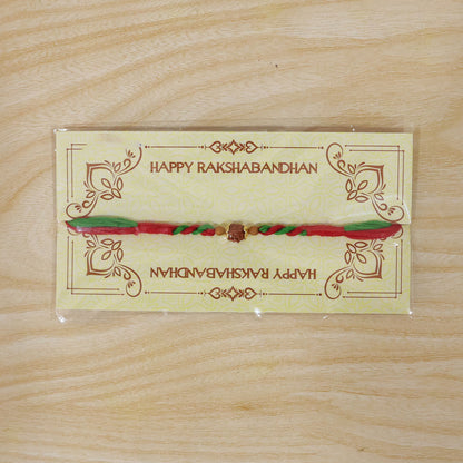 Green Red Designer Rakhi with Golden Bead Accents and Traditional Festive Beauty