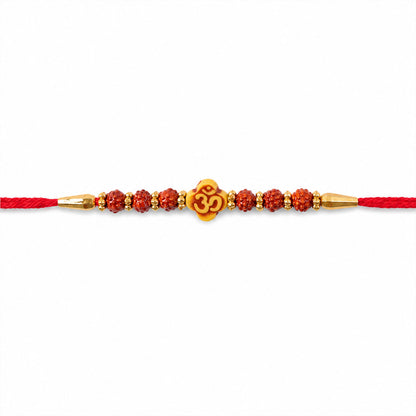 Om Bead Rakhi with Red Brown Accents and Spiritual Festive Brother Gift Styling Ideas