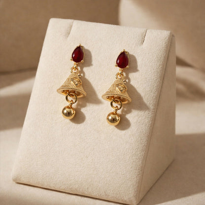 Ruby teardrop stud jhumka earrings with textured gold bell drop front view