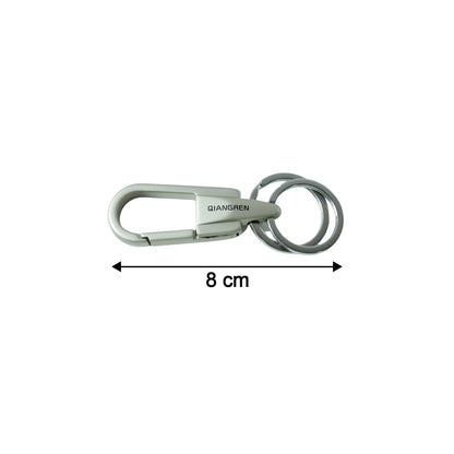 Stylish metal key holder carabiner in hand