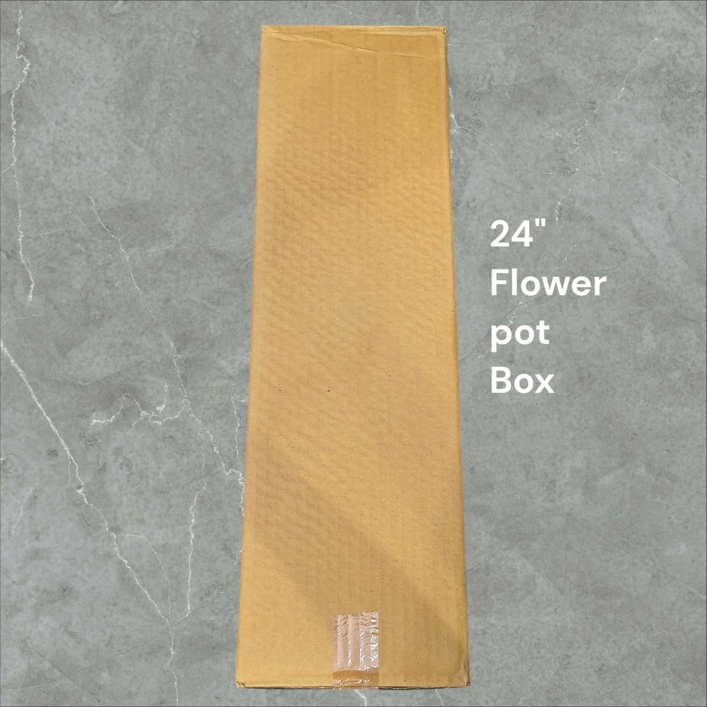 Large handcrafted metal flower vase on floor