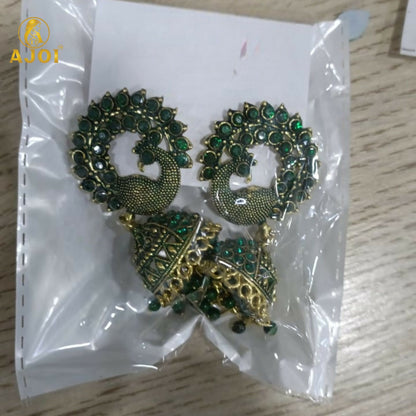 Pair of Peacock Green Stone Jhumka Earrings on white background