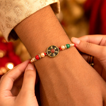 Oxidised Antique Chakra Wheel Designer Rakhi for Brother with Red Stone