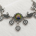 Oxidized Silver Peacock Feather Adjustable Bracelet with Carved Peacock Motifs & Heart Dangles
