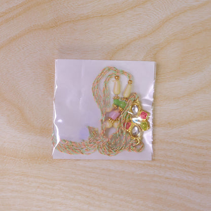 Floral Cross Kundan Pendant Rakhi with Multicolor Beads