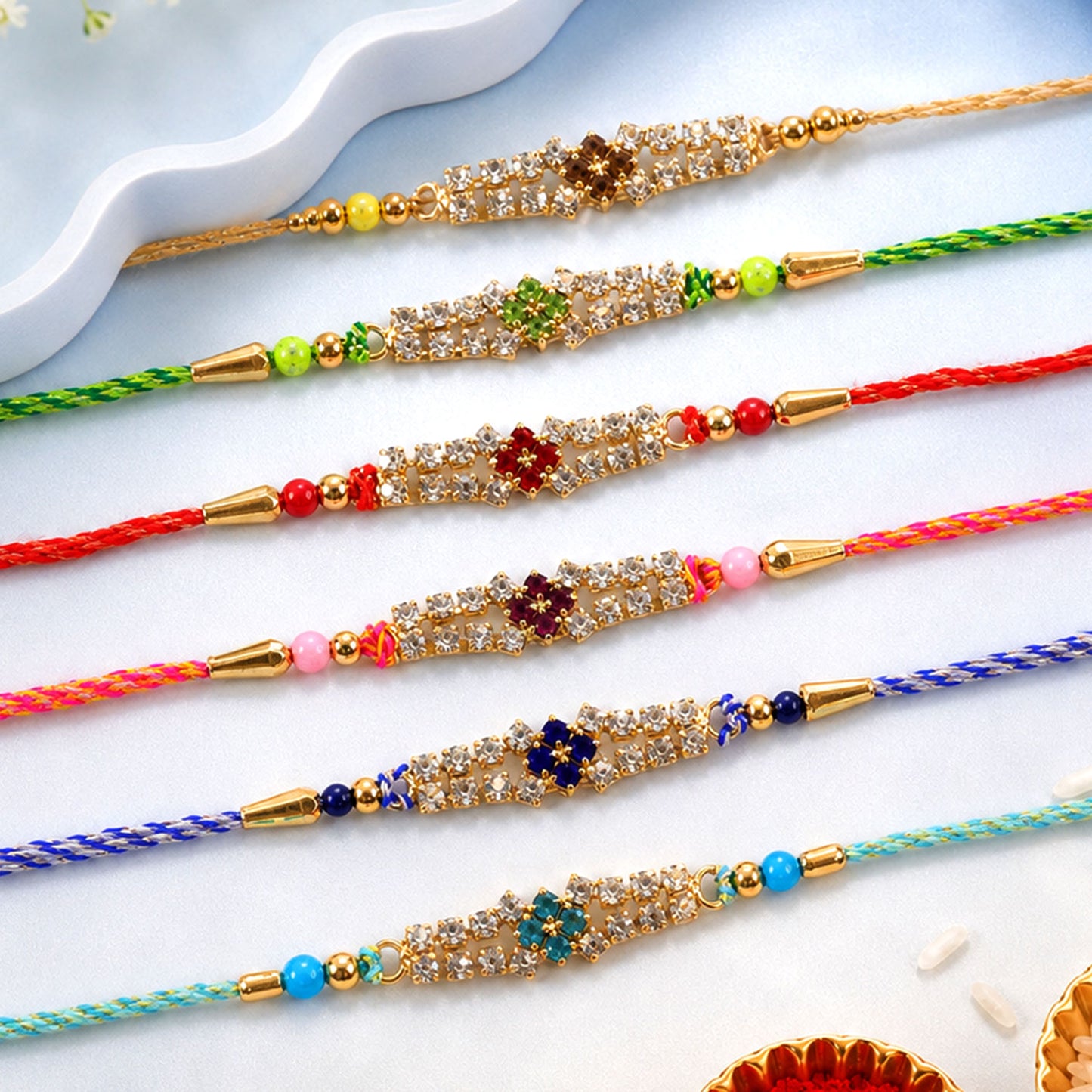 Floral Motif Stone Bar Rakhi for Raksha Bandhan (Pack of 6)