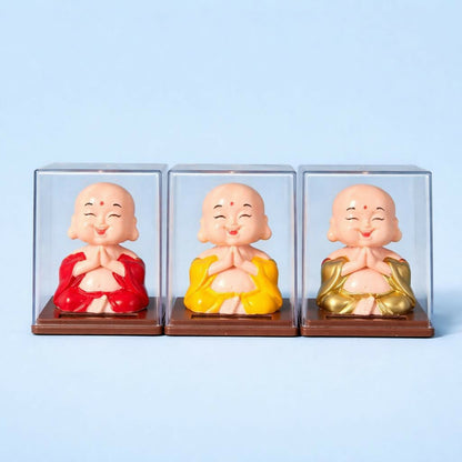 Solar Laughing Monk Bobble Head with Moving Head Display Case (Color may vary)