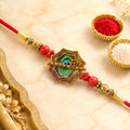 Shop Peacock Feather Rakhi Golden Frame Red Beads (10pcs)