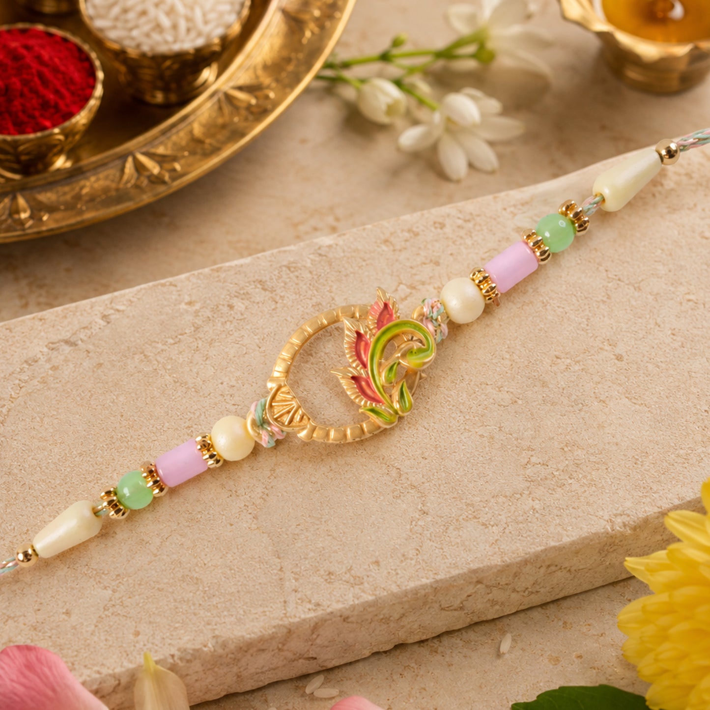 Enamel Peacock Pendant Rakhi with Green and Orange Beads