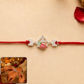 Rakhi – Elegant Silver Crown with Pink Stone & Red Thread for Raksha Bandhan