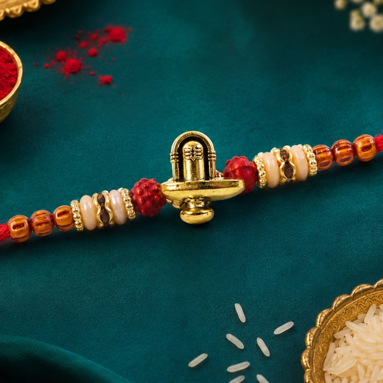 Lord Shiva Shivling Trishul Devotional Rakhi with Golden Temple Centre and Red Thread