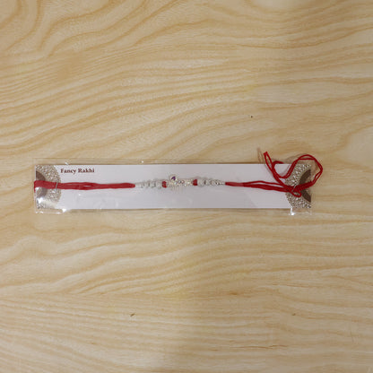 Elegant Radhe Silver Rakhi with Decorative Beads and Red Thread