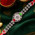 Silver-Toned Crystal Rakhi with Circular Designer Centerpiece, Dual Stone Chains & Red Thread
