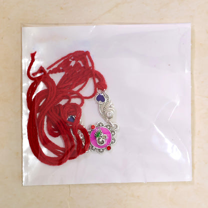 Premium Rakhi featuring Round Floral Medallion, gold trims and chain look for Gift