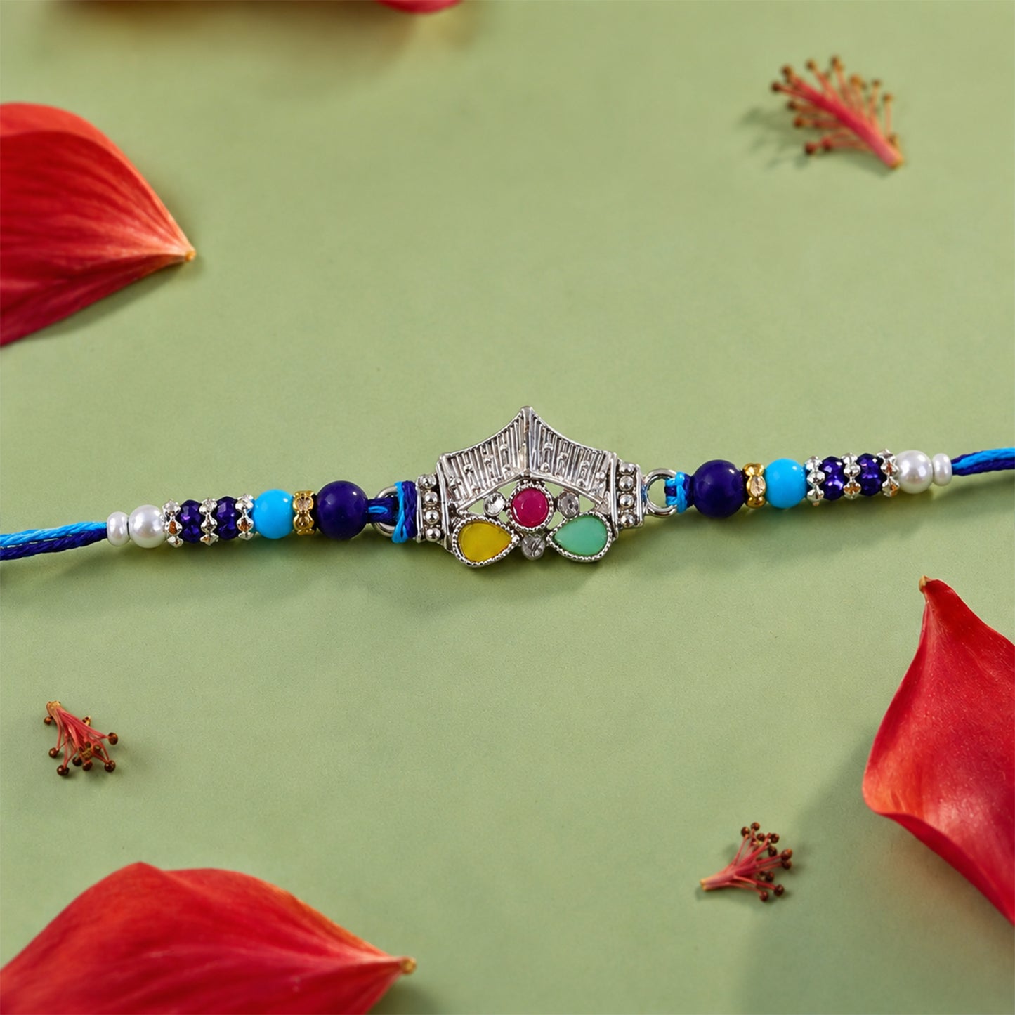 Silver Crown Temple Rakhi with Multicolor Stones, Roli Chawal Coin and Card Gift Packing