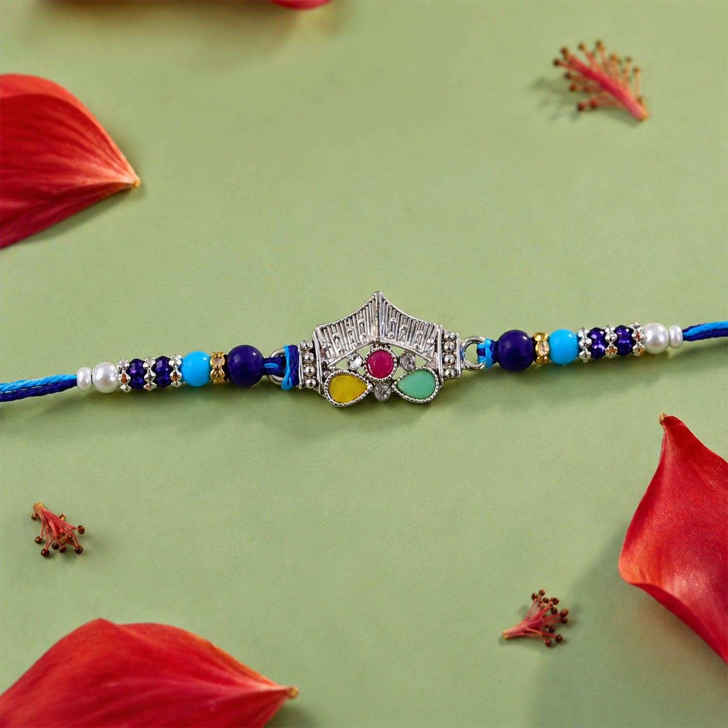 Silver Crown Temple Rakhi with Multicolor Stones, Roli Chawal Coin and Card Gift Packing