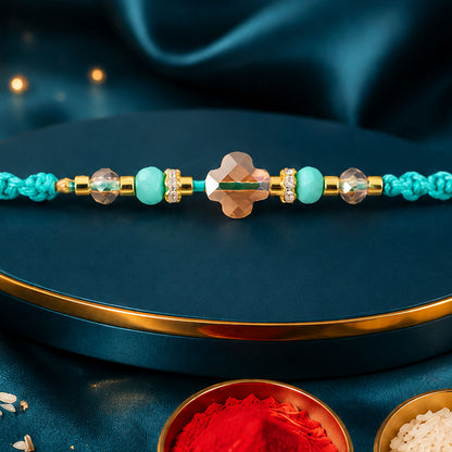Elegant Stone Work Rakhi with Red Thread, Bead Detailing and Premium Celebration Look