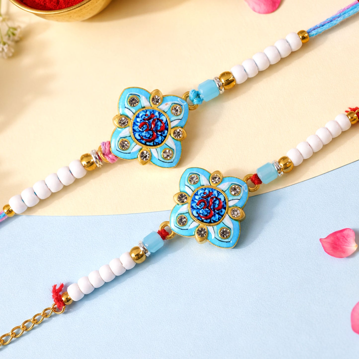 Om Printed Clover Crystal Studded Pearl Beads Bhai Bhabhi Rakhi Set
