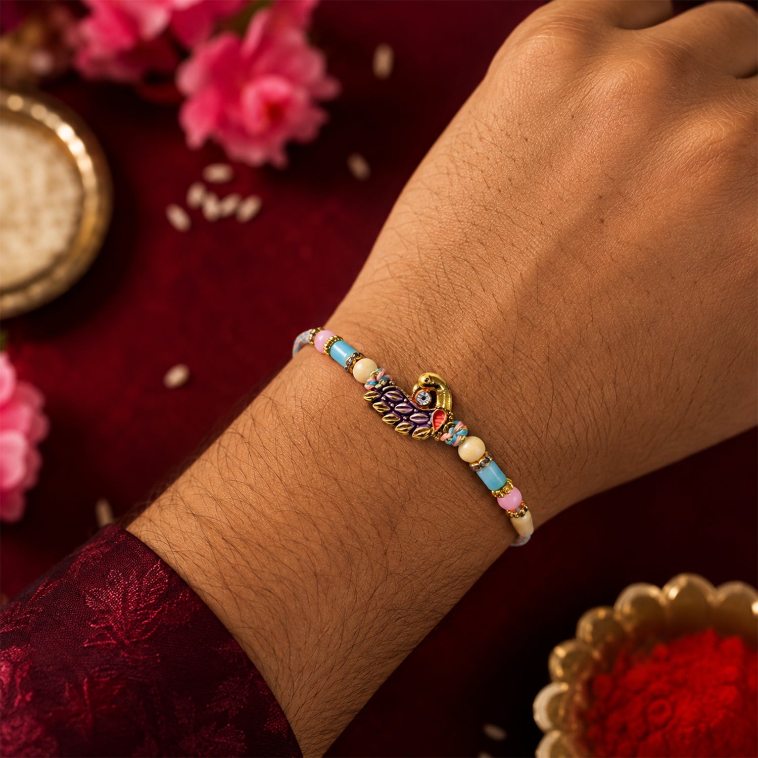 Blue Enamel Peacock Pendant Rakhi with Pastel Beads