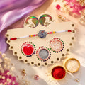 Om Symbol Silver Centre Rakhi with Roli Chawal & Gift Packing