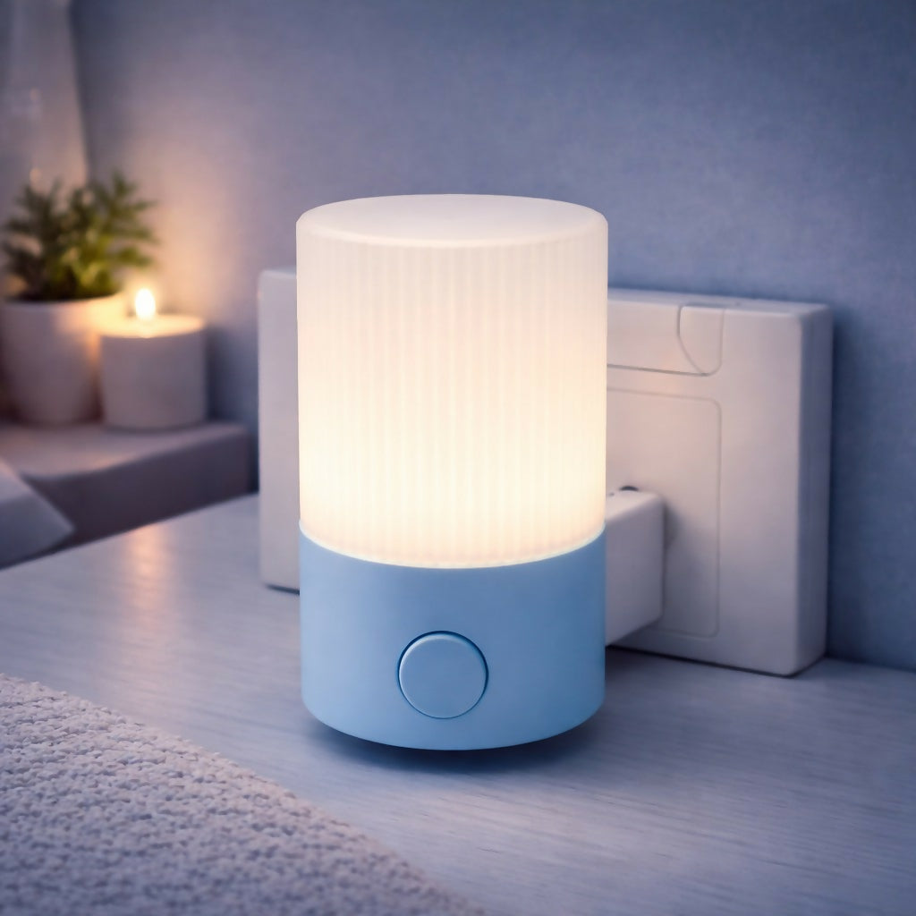 Portable LED night lamp with soft light on bedside table