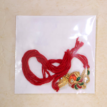 Gold-Toned Lord Ganesha Rakhi with Multicolor Enamel, Crystal Accents & Designer Red Thread