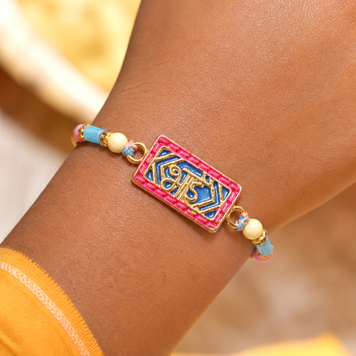 Classic Rakhi showcasing Shubh Plaque, crystal accents and plaque look for Gift Use