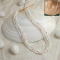Pearl Beaded Mala Necklace – Elegant multi-layered design with pink accents