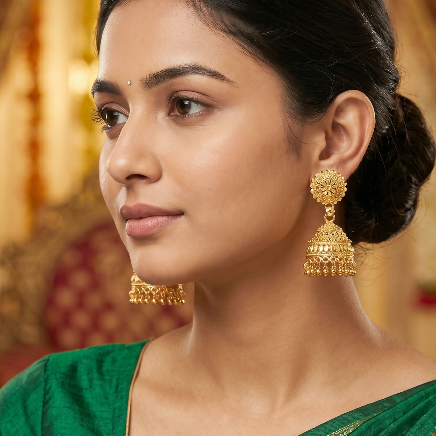 Gold jhumka earrings and pearl danglers detailed shot