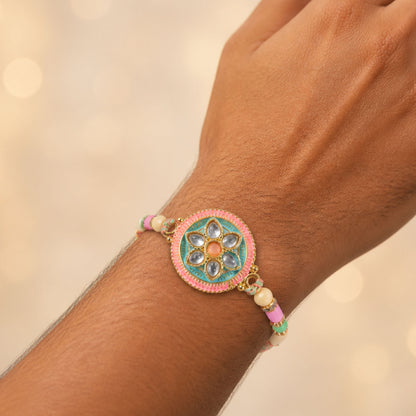 Teal and Pink Round Kundan Pendant Rakhi with Pastel Beads